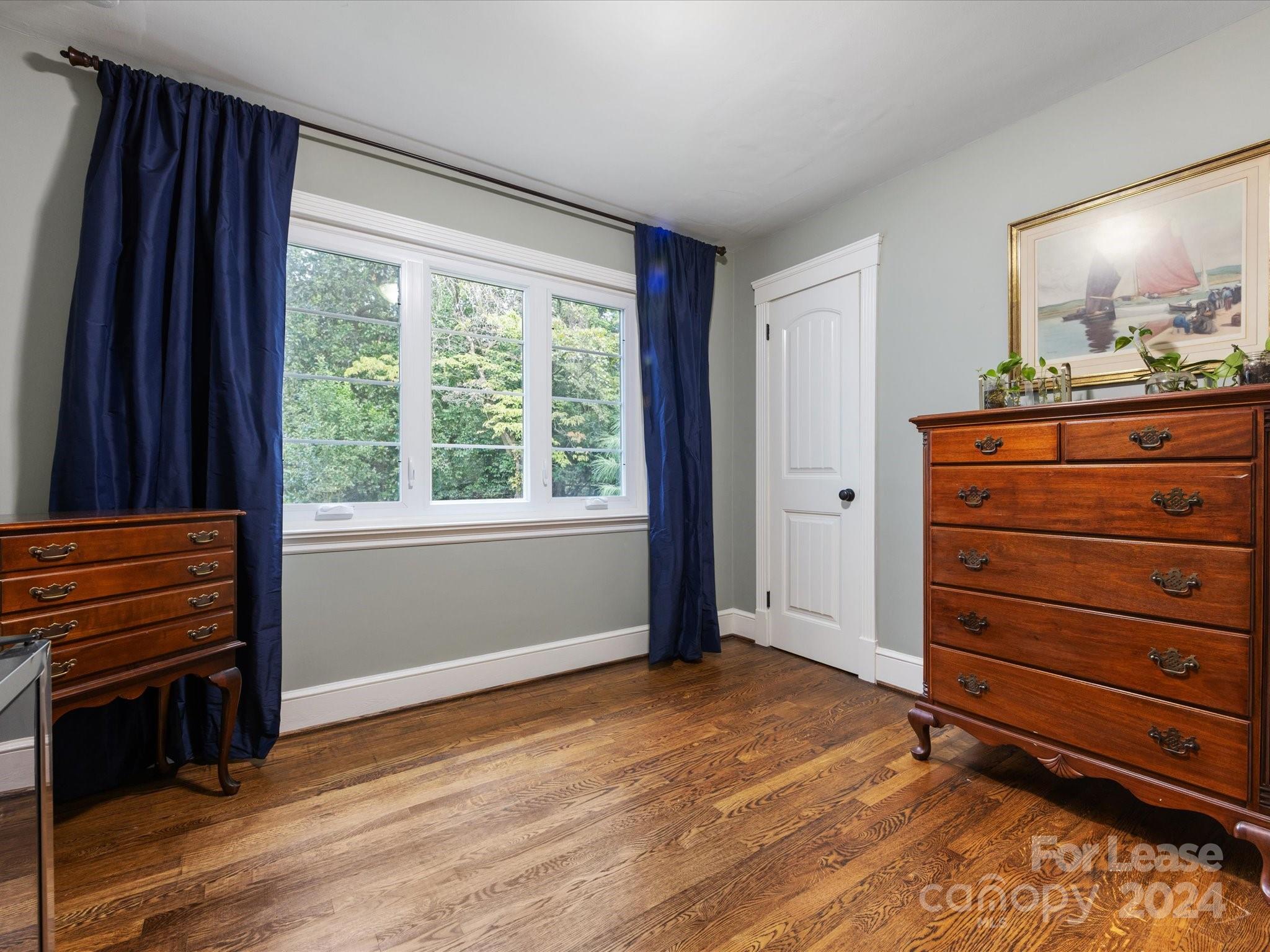 4411 Castleton Road Charlotte, NC 28211 - Photo 31 of 45 a view of room with window and dresser