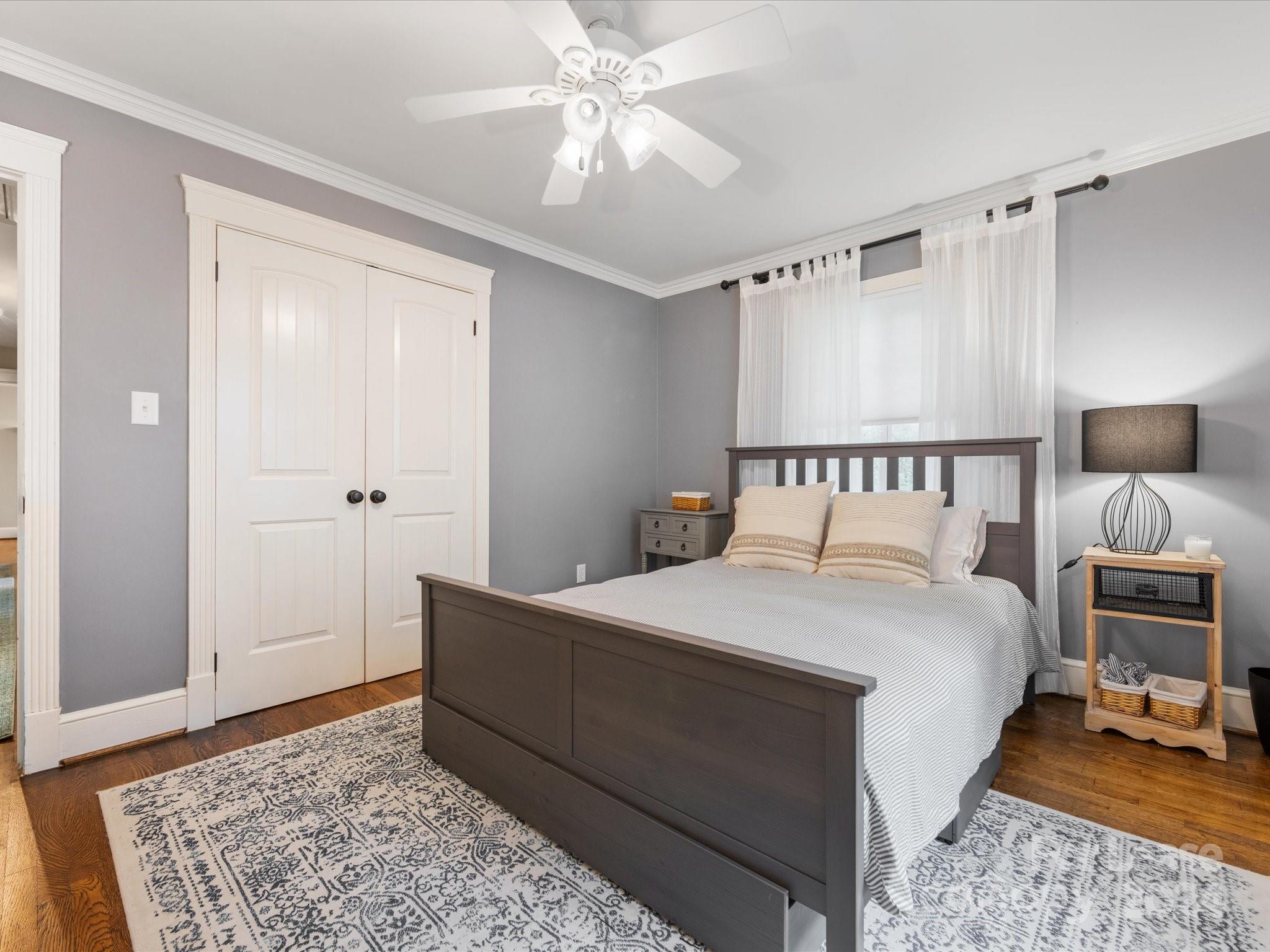 4411 Castleton Road Charlotte, NC 28211 - Photo 35 of 45 a bedroom with a bed and a couch