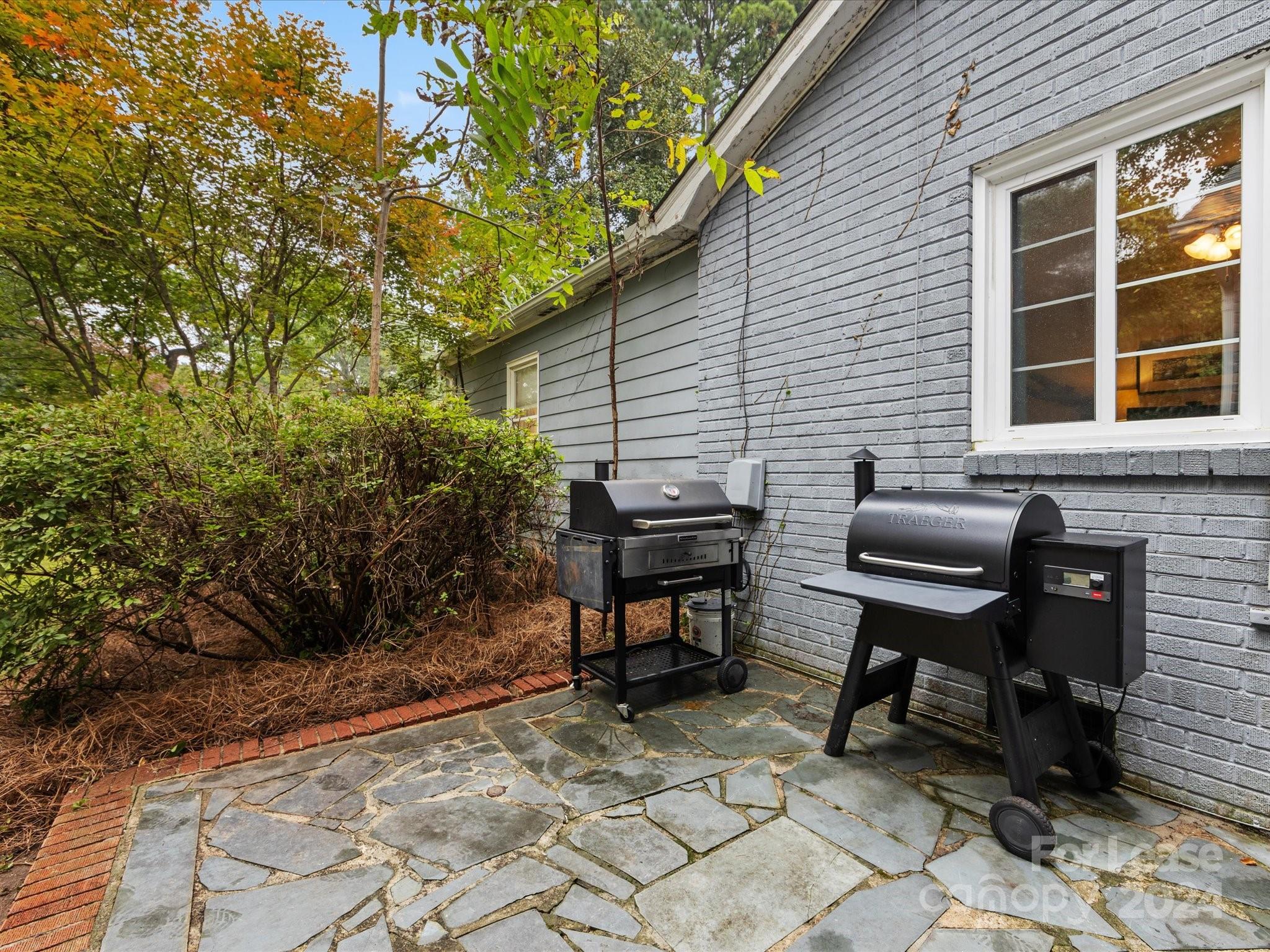 4411 Castleton Road Charlotte, NC 28211 - Photo 39 of 45 a view of a two chairs in back of the house