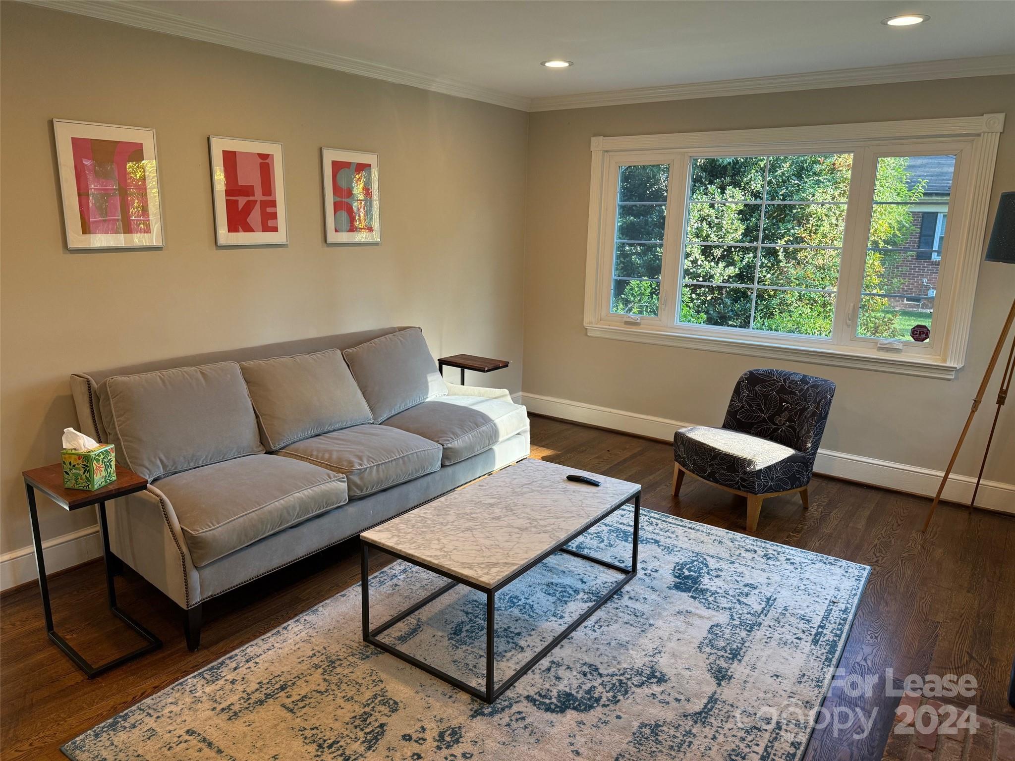 4411 Castleton Road Charlotte, NC 28211 - Photo 7 of 45 a living room with furniture and a window