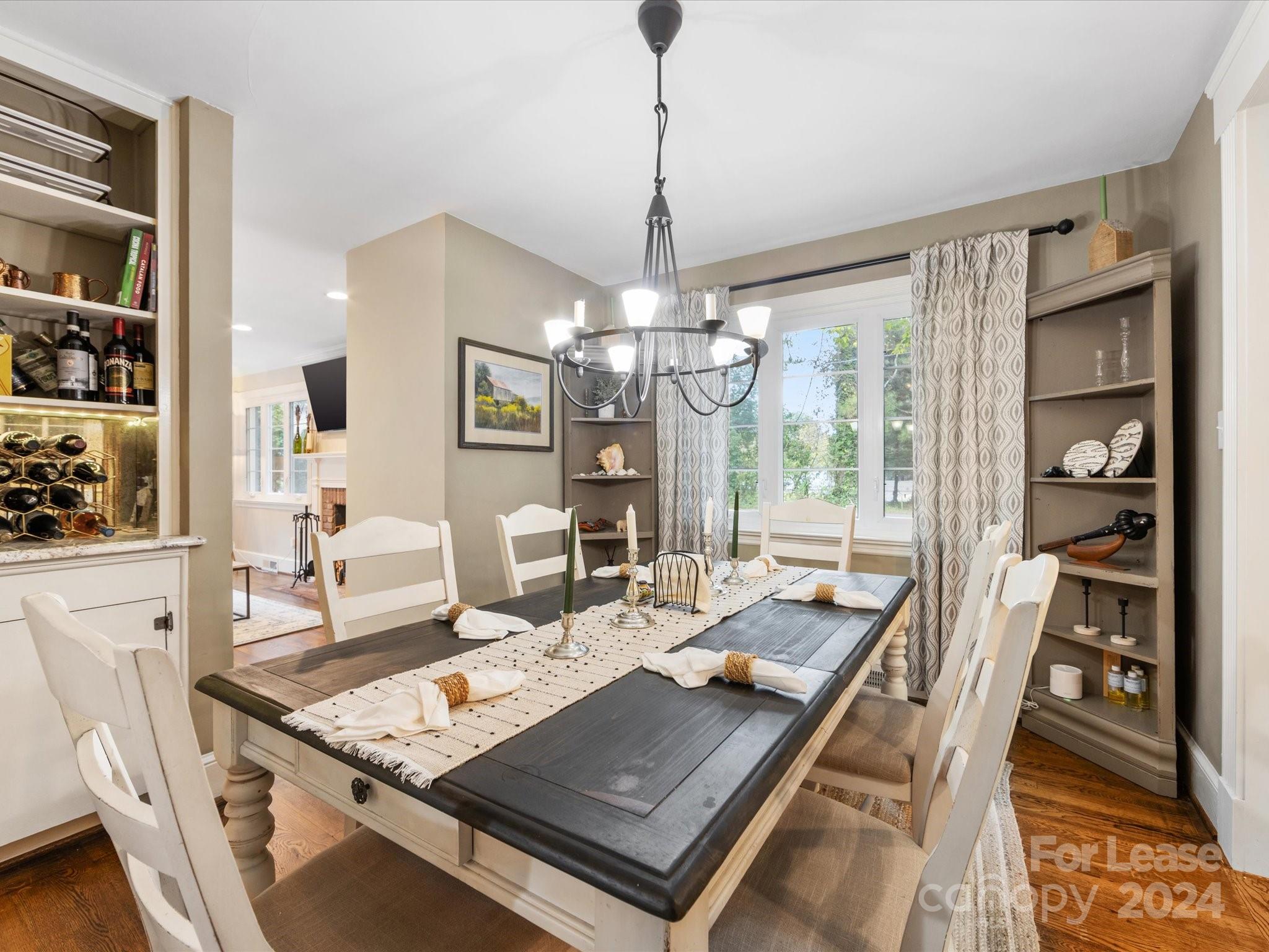 4411 Castleton Road Charlotte, NC 28211 - Photo 10 of 45 a view of a dining room with furniture window and wooden floor