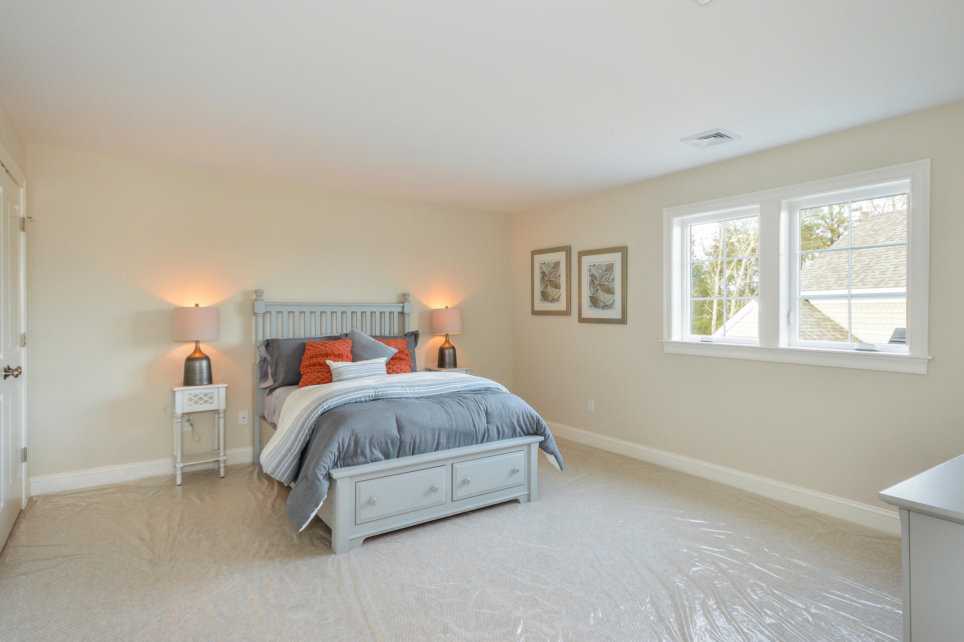 23 Rosewood Circle Mashpee, MA 02649 - Photo 13 of 25 a spacious bedroom with a bed and a window