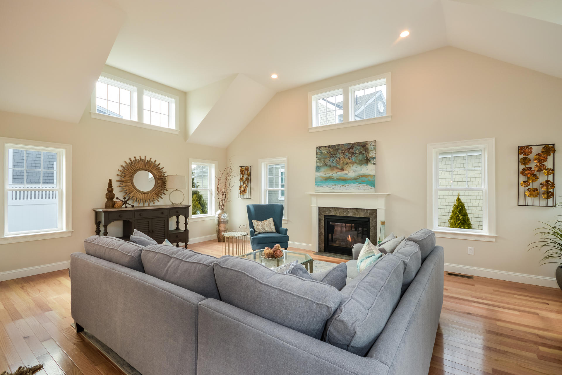 23 Rosewood Circle Mashpee, MA 02649 - Photo 4 of 25 a living room with furniture a fireplace and a window
