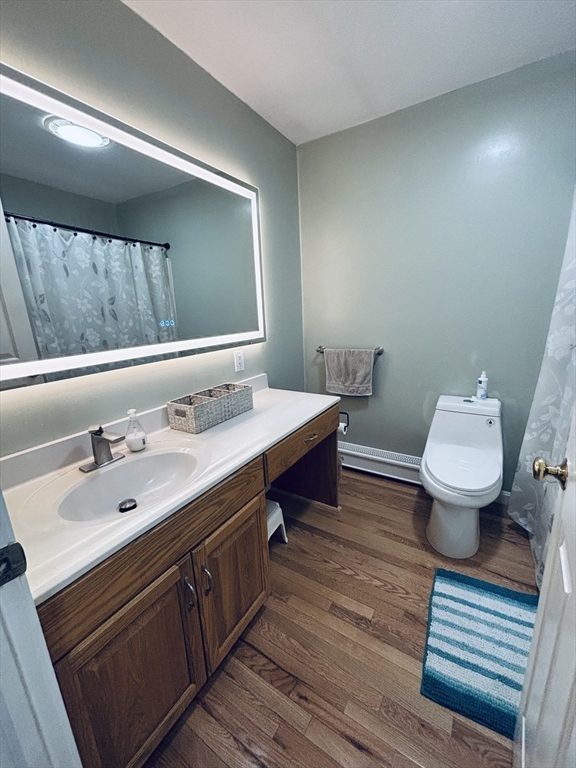 180 Beacon Street Clinton, MA 01510 - Photo 15 of 30 a bathroom with a sink and a mirror