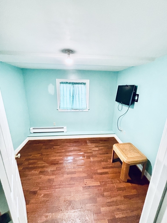 180 Beacon Street Clinton, MA 01510 - Photo 17 of 30 a view of a room with wooden floor