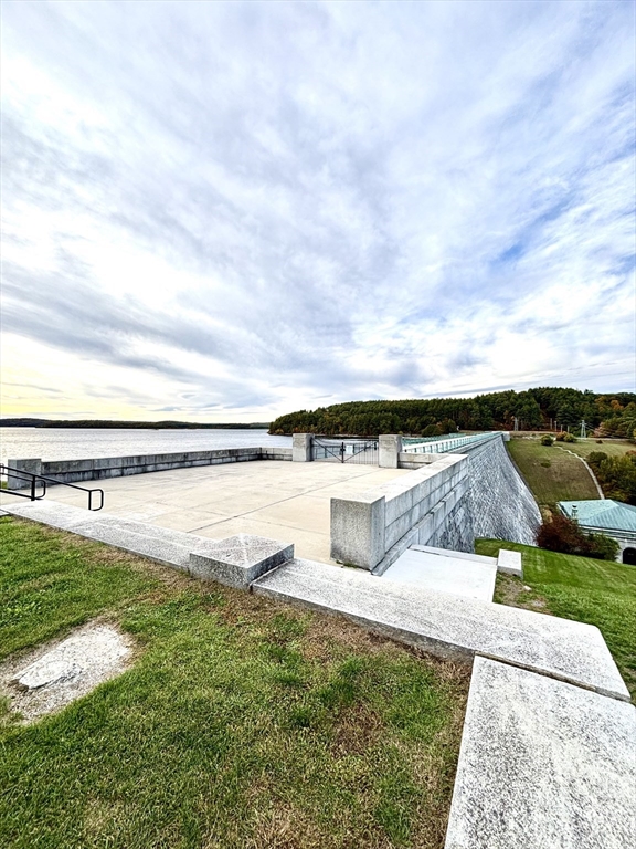 180 Beacon Street Clinton, MA 01510 - Photo 26 of 30 a view of a swimming pool with an outdoor seating