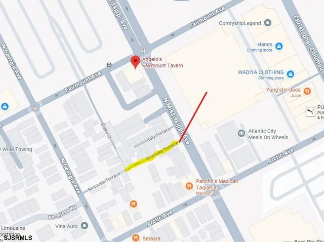 a view of an entryway with a front door