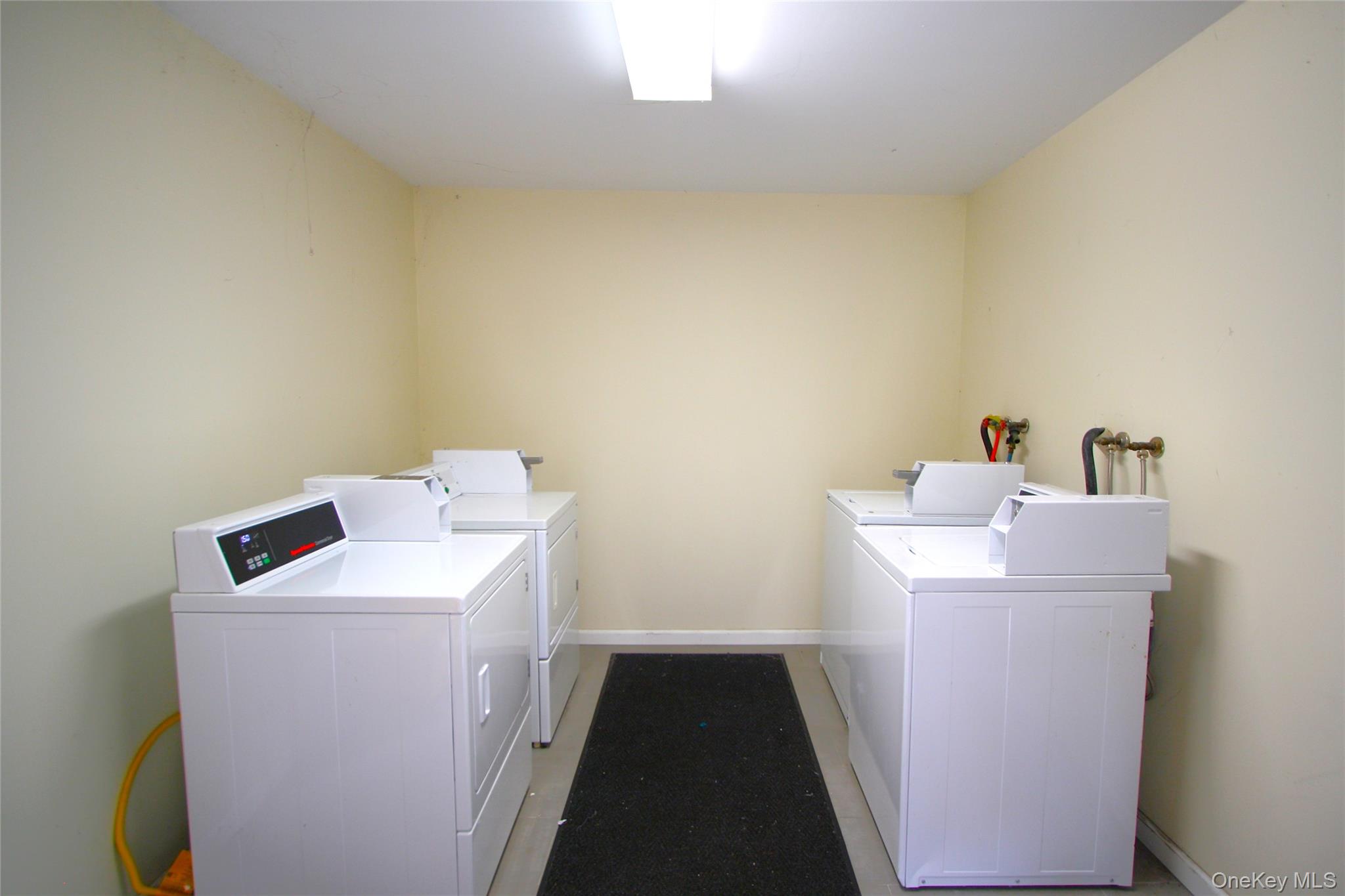 3115 Albany Post Road, Unit 2 Buchanan, NY 10511 - Photo 10 of 15 The lower level laundry room is a true luxury - no need to haul your clothing to the local laundromat.
