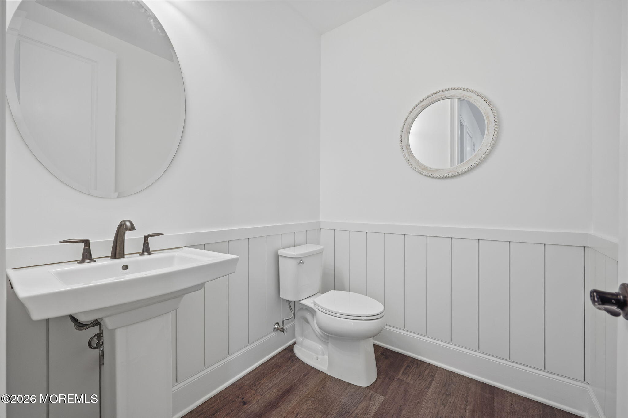 66 Windermere Road Lincroft, NJ 07738 - Photo 31 of 48 a white toilet sitting next to a bathroom sink