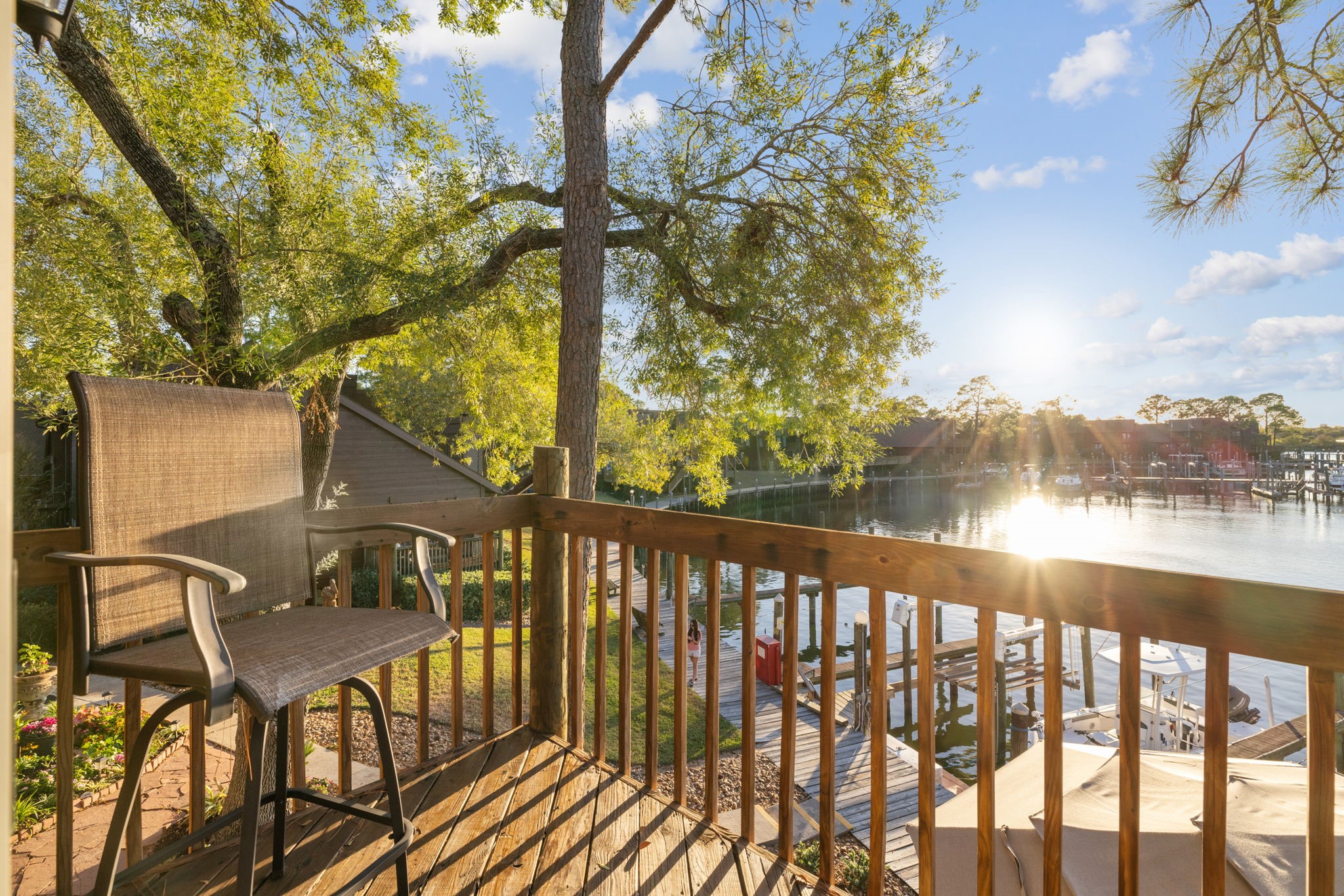 659 Davis Road League City, TX 77573 - Photo 16 of 34 a view of a balcony with chairs and wooden fence