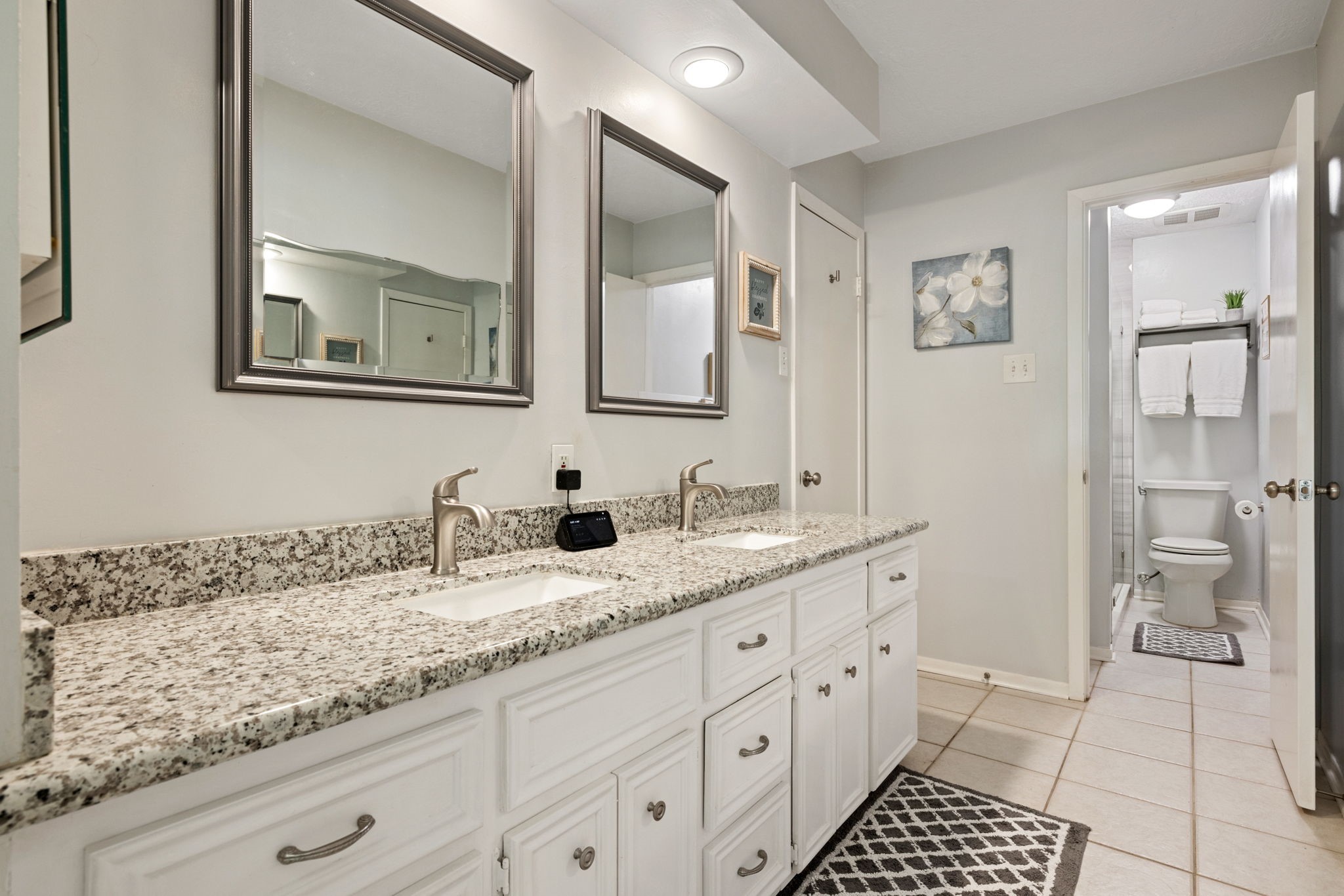 659 Davis Road League City, TX 77573 - Photo 17 of 34 a bathroom with a granite countertop sink and a mirror