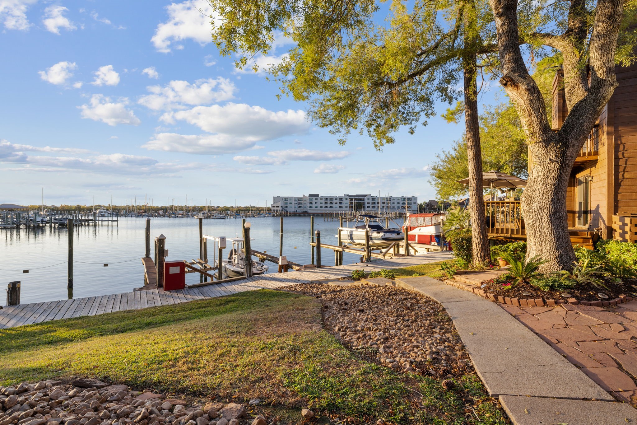 659 Davis Road League City, TX 77573 - Photo 25 of 34 a view of a swimming pool with an outdoor seating and a ocean view