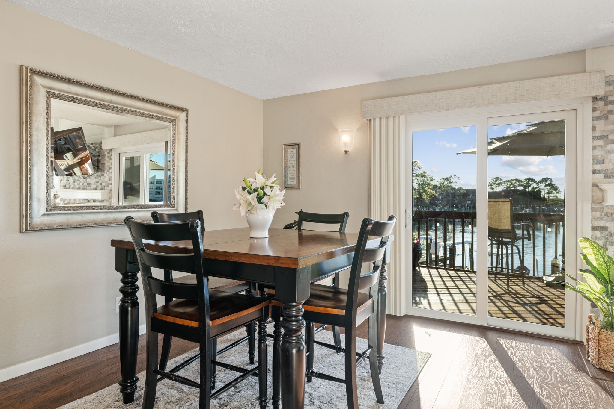 659 Davis Road League City, TX 77573 - Photo 7 of 34 a view of a dining room with furniture and wooden floor