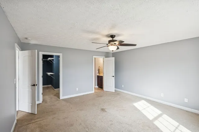 a bathroom with a bathtub and a sink