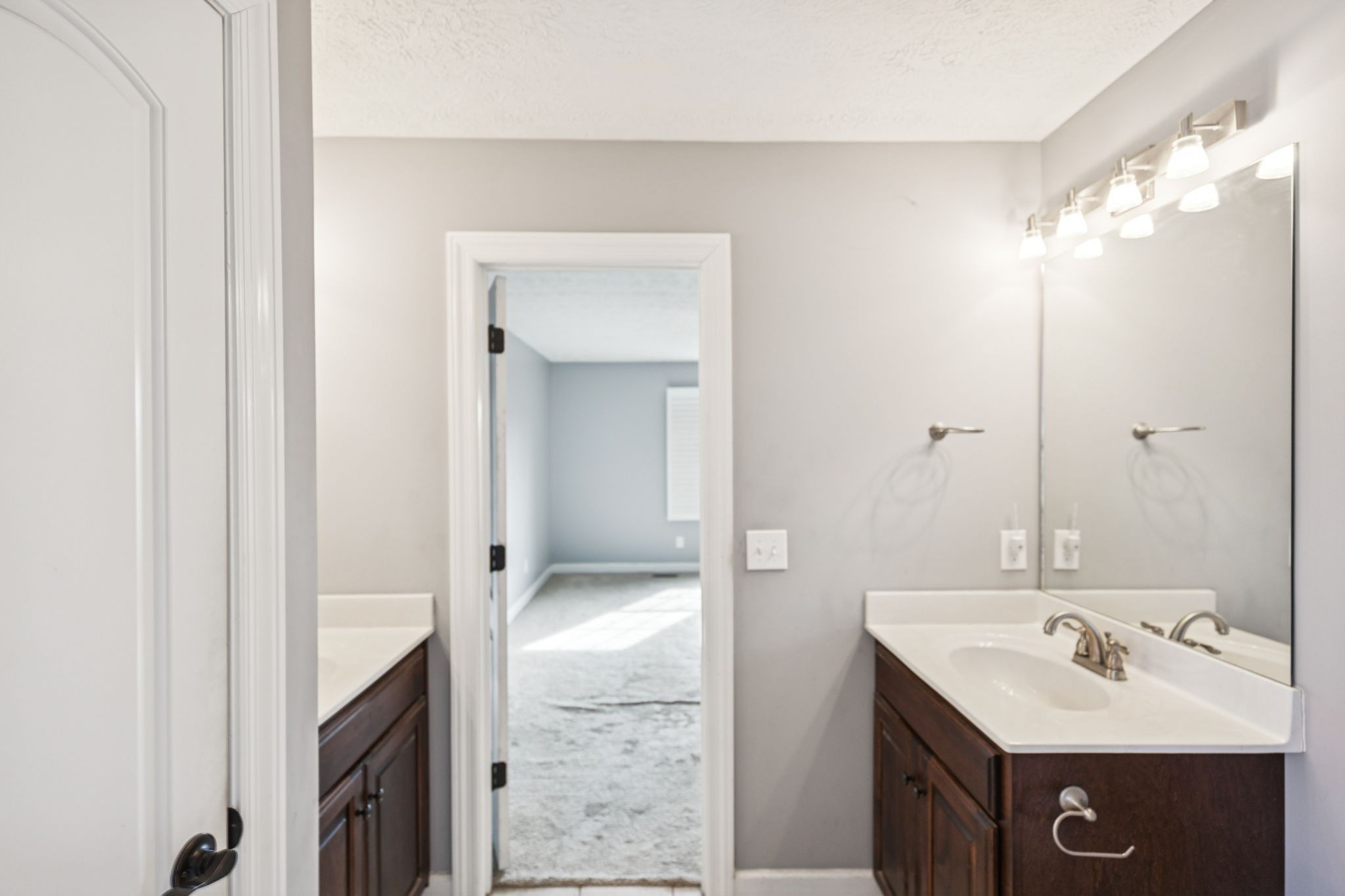 5453 Hillsboro Viola Road Manchester, TN 37355 - Photo 17 of 49 a bathroom with a sink a mirror and a shower