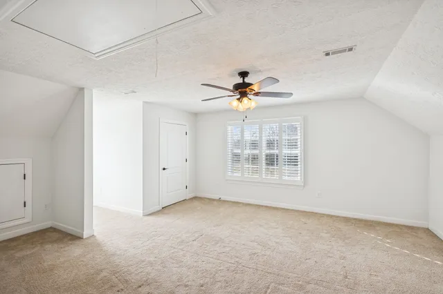 a view of a swimming pool with an outdoor space and seating area