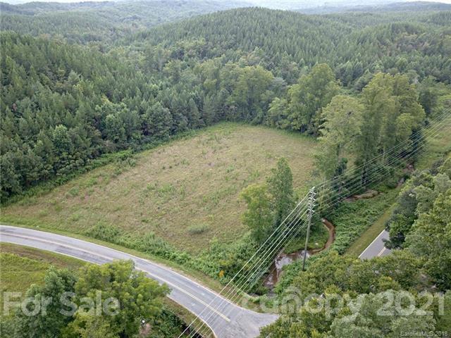 999 Holbert Cove Road, Unit 4 Saluda, NC 28773 - Photo 13 of 14 a view of a yard with a small space
