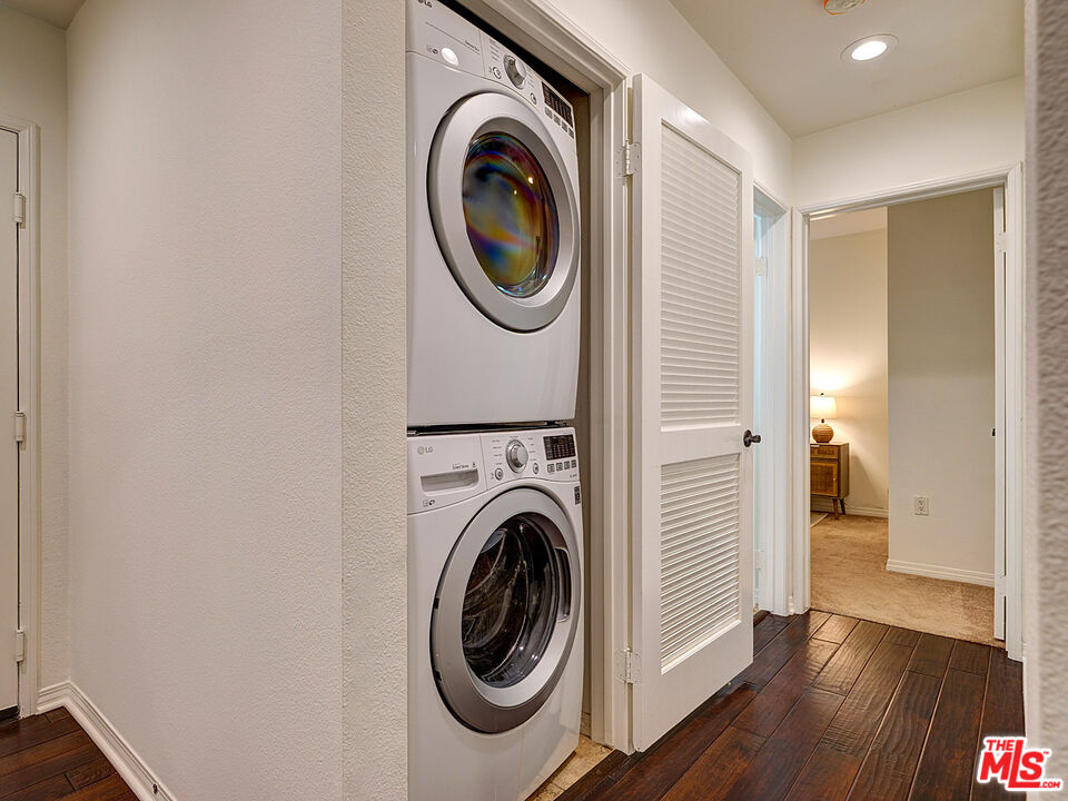 6020 South Seabluff Drive, Unit 122 Playa Vista, CA 90094 - Photo 17 of 33 a view of a hallway with washer and dryer