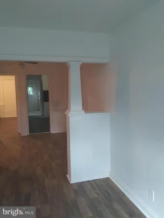 a white refrigerator freezer sitting inside of a kitchen