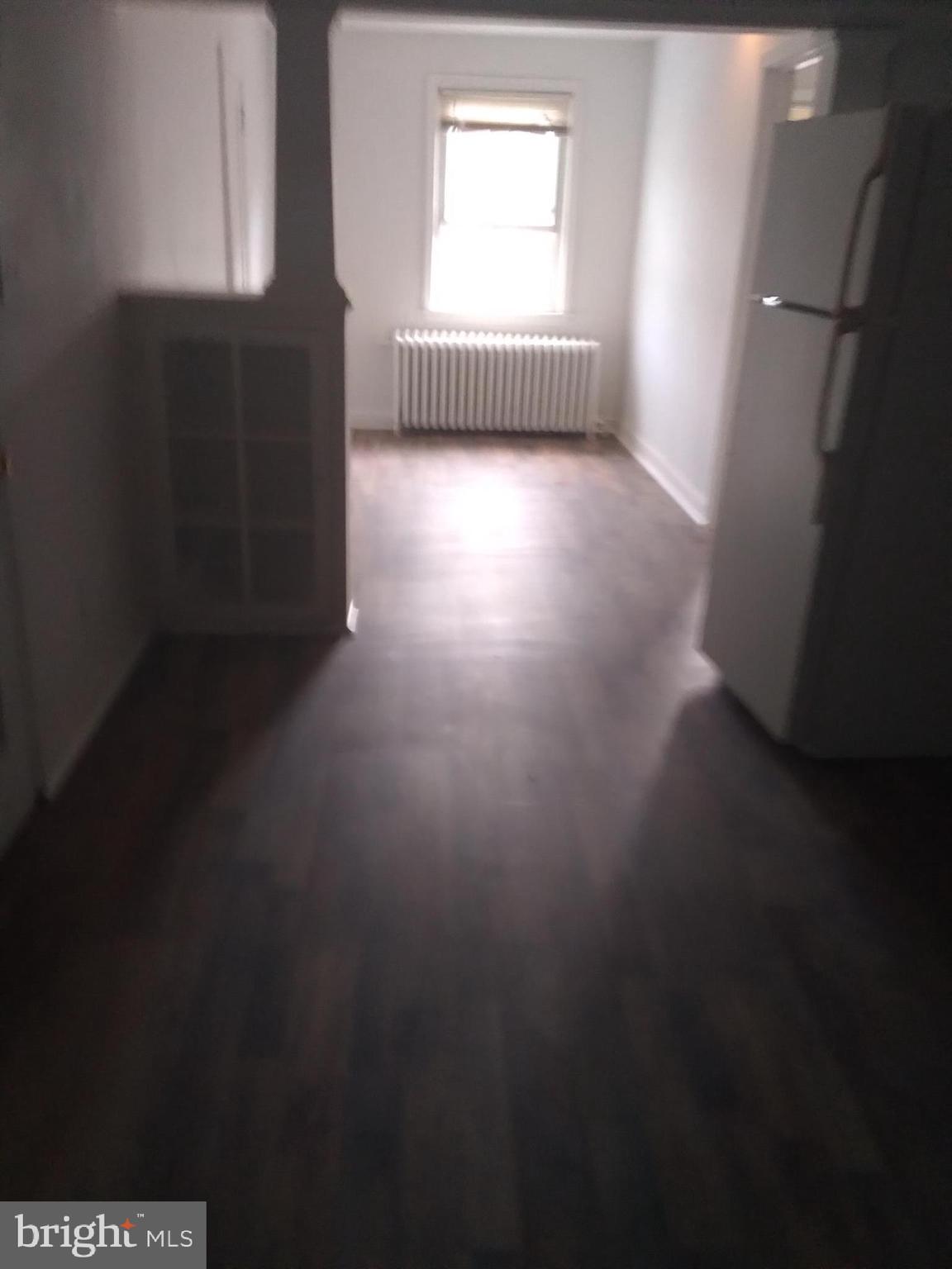 1205 30th Street Southeast Washington, DC 20019 - Photo 3 of 8 a view of an empty room and window