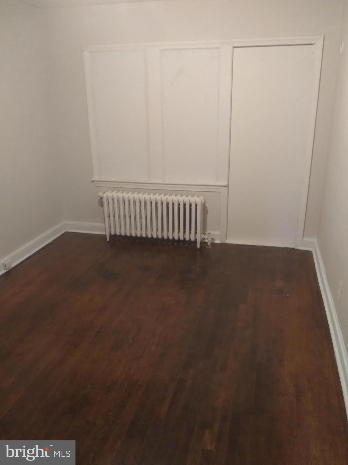 1205 30th Street Southeast Washington, DC 20019 - Photo 7 of 8 a view of a room with wooden floor