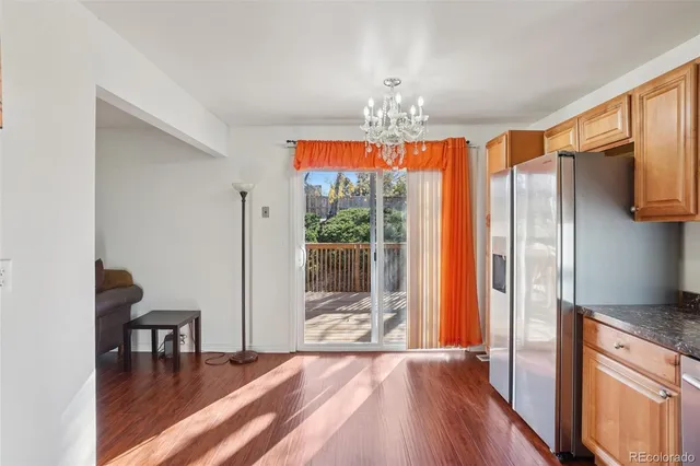 a bathroom with a sink toilet vanity and shower