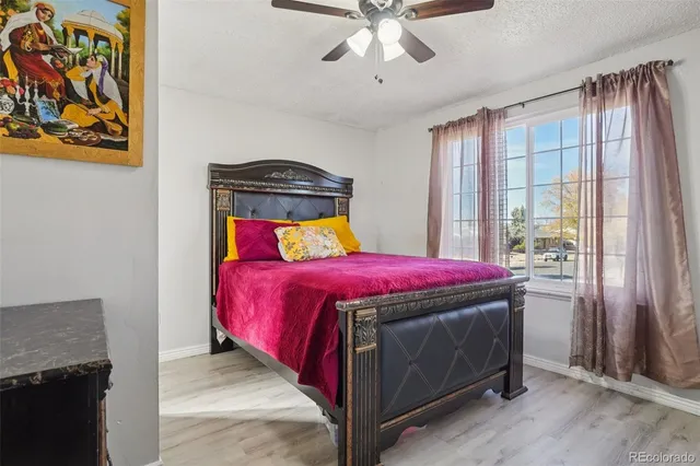 a bedroom with a bed and a closet