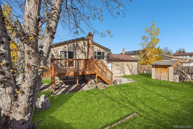 a view of a backyard with a garden