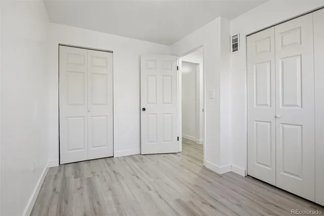 a view of a wooden roof with trees