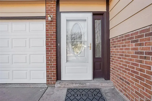 a view of a door and a window