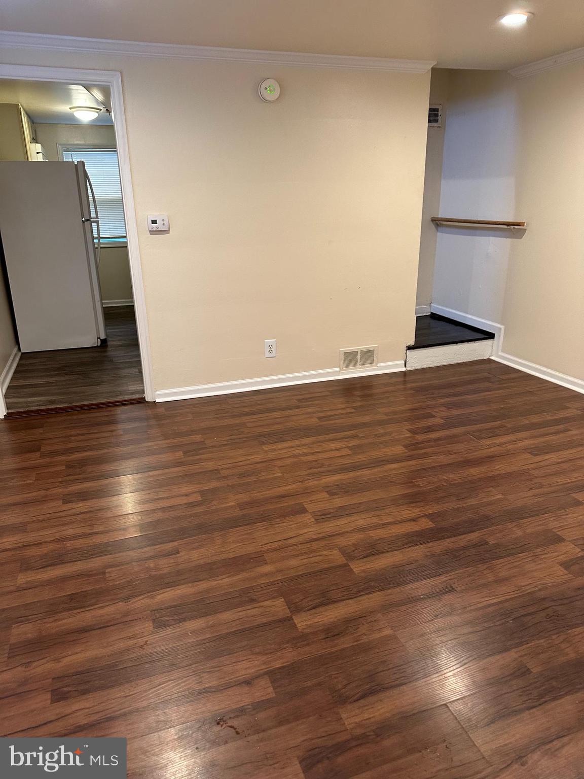 401 Maple Lane Dundalk, MD 21222 - Photo 11 of 15 a view of room with wooden floor