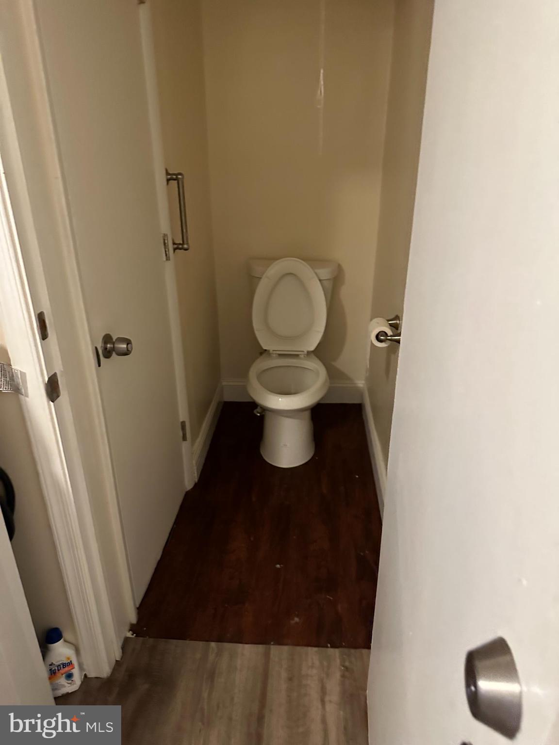 401 Maple Lane Dundalk, MD 21222 - Photo 13 of 15 a bathroom with a toilet and a mirror