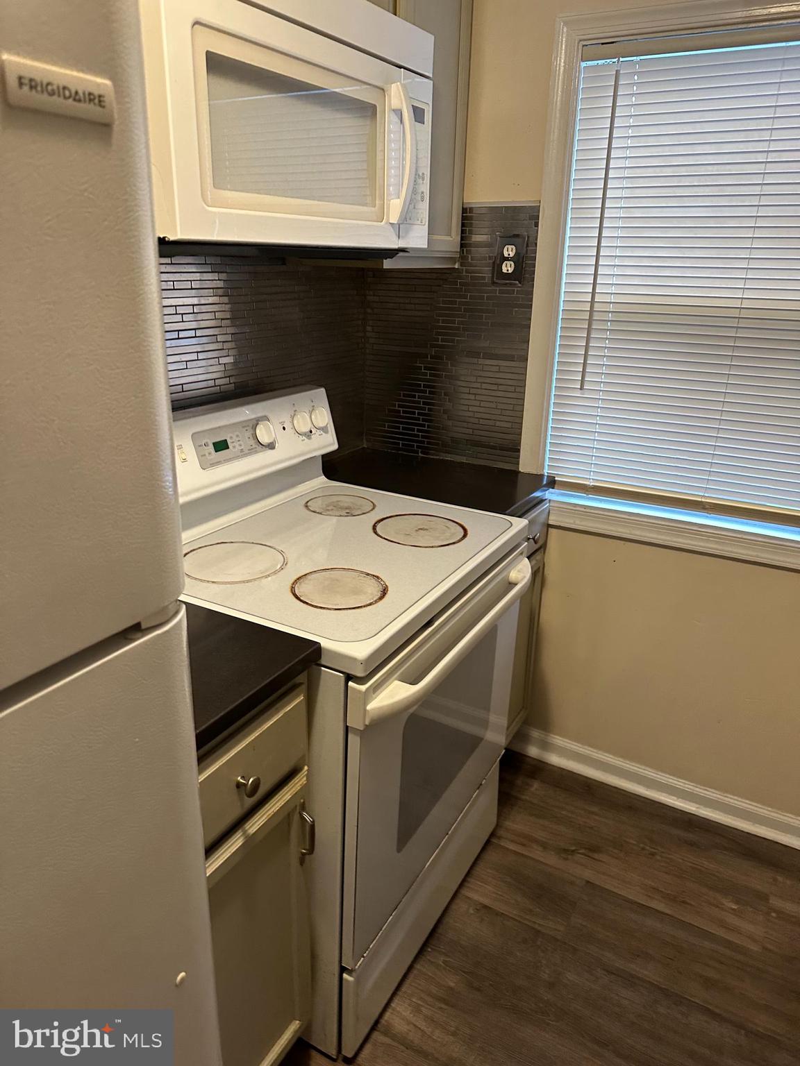 401 Maple Lane Dundalk, MD 21222 - Photo 14 of 15 a utility room with dryer and washer