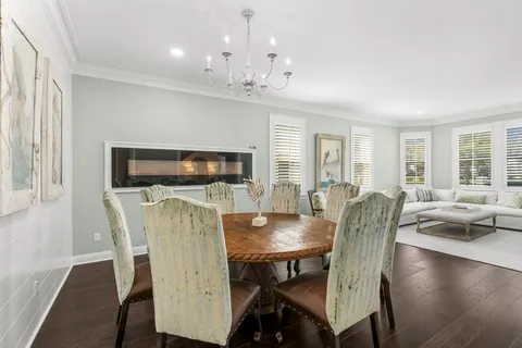 a kitchen with stainless steel appliances granite countertop a stove refrigerator and microwave