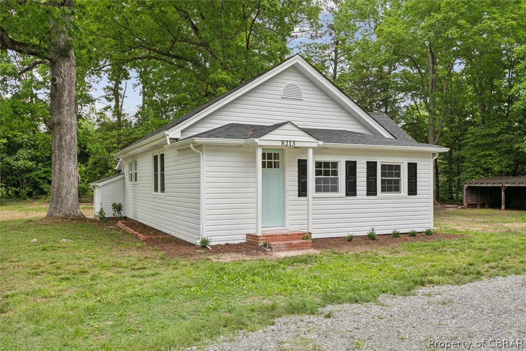 8213 Croaker Road Williamsburg, VA 23188 - Photo 4 of 50 View of front of property featuring a front lawn