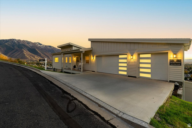1800 Spring Oaks Drive Springville, UT 84663 - Photo 1 of 68 View of front of property with driveway, a garage, and covered porch