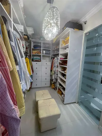 a view of an empty room with a fireplace