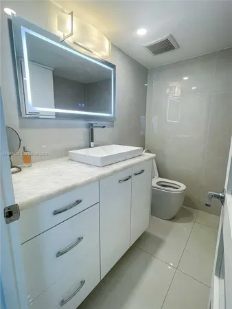 a bathroom with a sink and a toilet