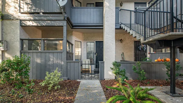 front view of a house with a small yard