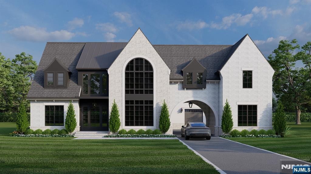 41 Orchard Road Demarest, NJ 07627 - Photo 1 of 17 a front view of a house with a yard