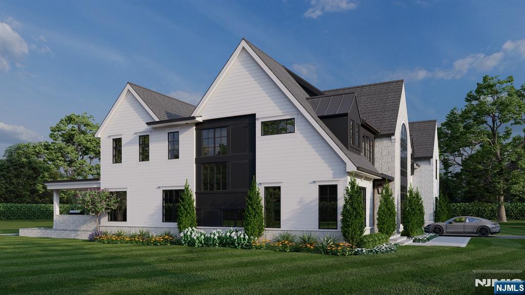 41 Orchard Road Demarest, NJ 07627 - Photo 14 of 17 a front view of house with a garden and trees