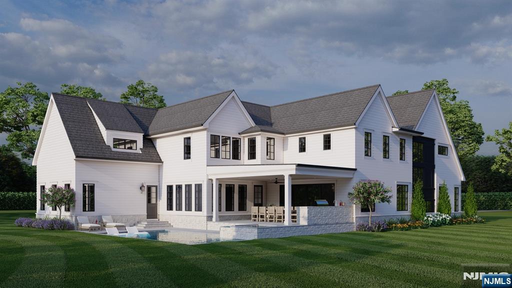 41 Orchard Road Demarest, NJ 07627 - Photo 16 of 17 a front view of house with garden and trees in the background