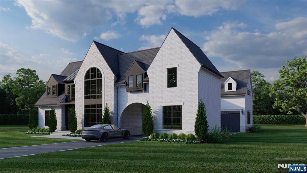 41 Orchard Road Demarest, NJ 07627 - Photo 3 of 17 a front view of house with a garden