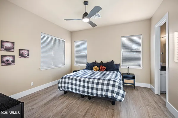a work room with furniture and wooden floor