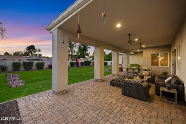 a view of a patio with furniture
