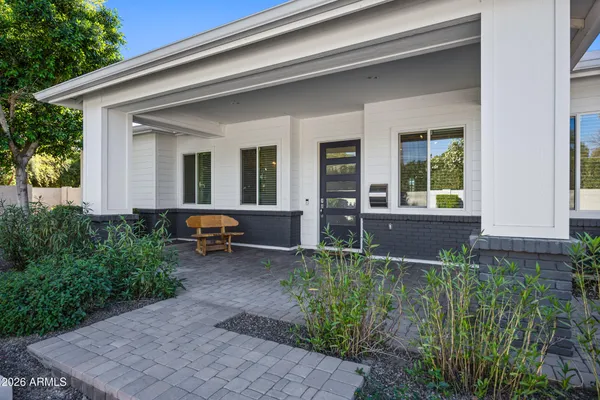 a house view with a garden space