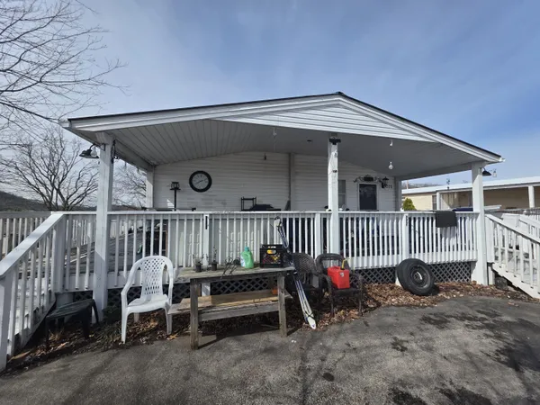 a view of a porch with a bench
