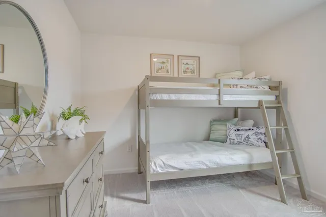 a kitchen with stainless steel appliances a refrigerator and a stove top oven