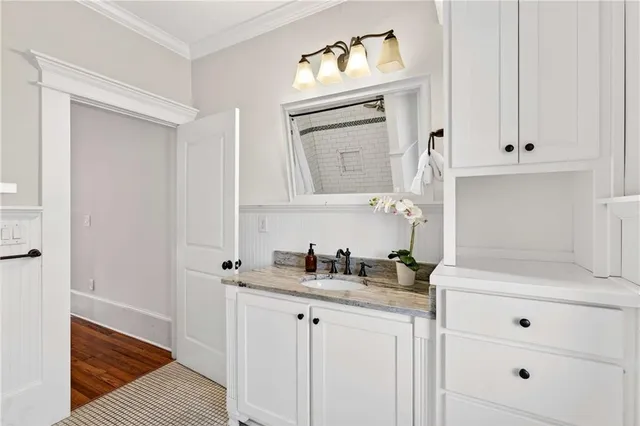 a spacious bedroom with a bed and a fireplace