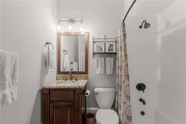 a living room with furniture window and wooden floor